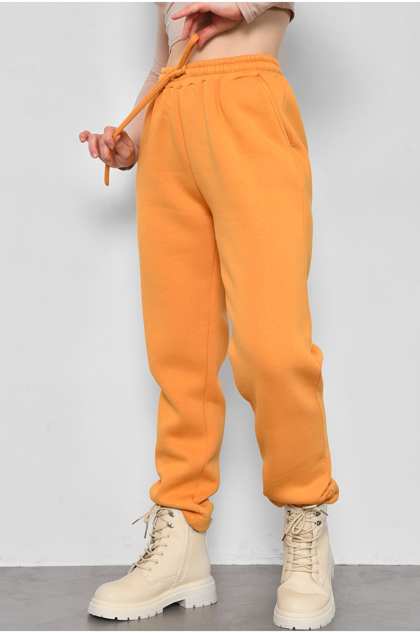 Спортивні штани жіночі на флісі гірчичного кольору 174712