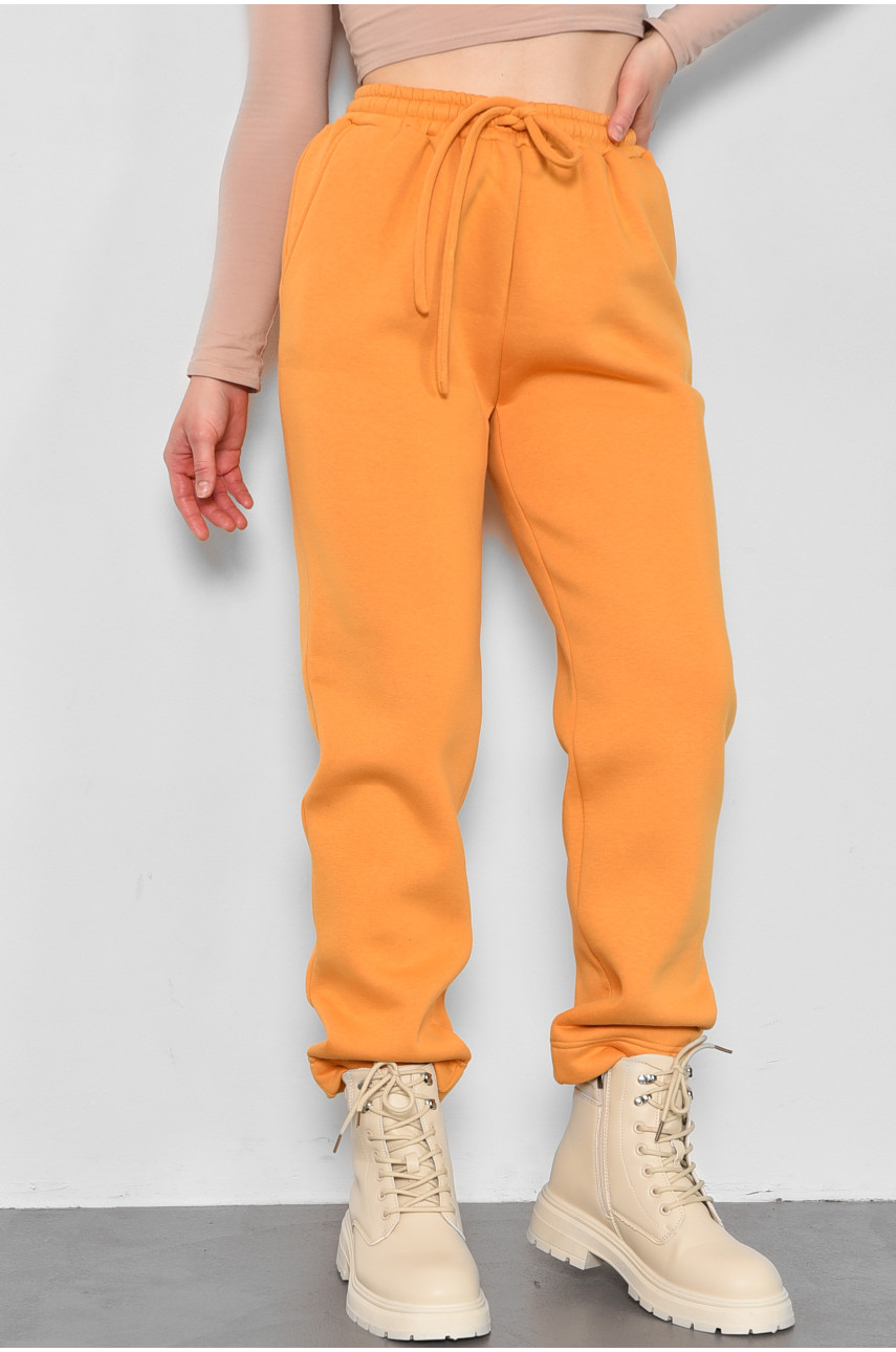 Спортивные штаны женские на флисе горчичного цвета 174712