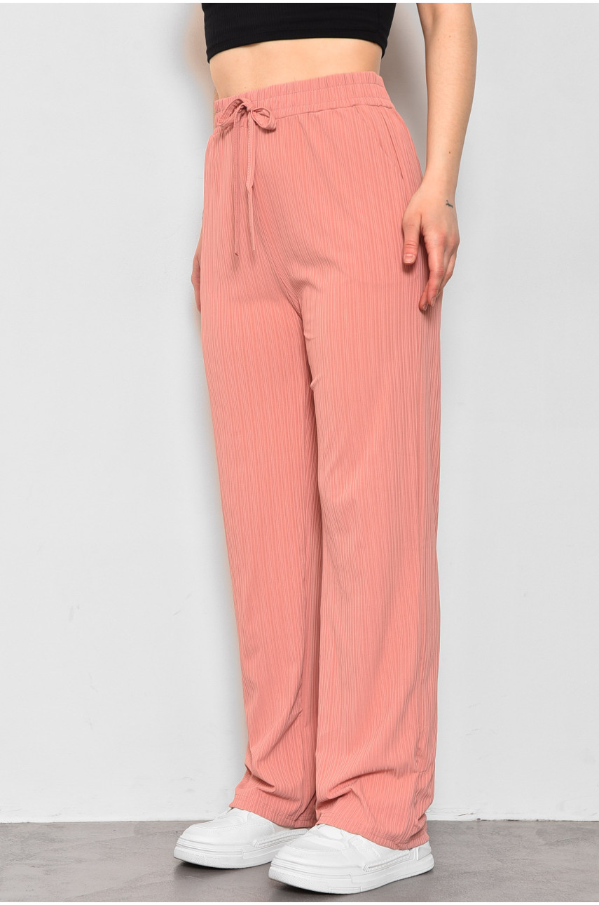 Штани жіночі розкльошені рожевого кольору 9830-1 175784