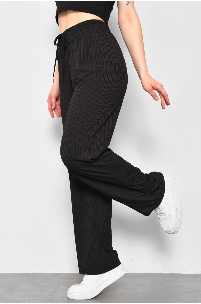 Штани жіночі розкльошені чорного кольору 9830-1 175793