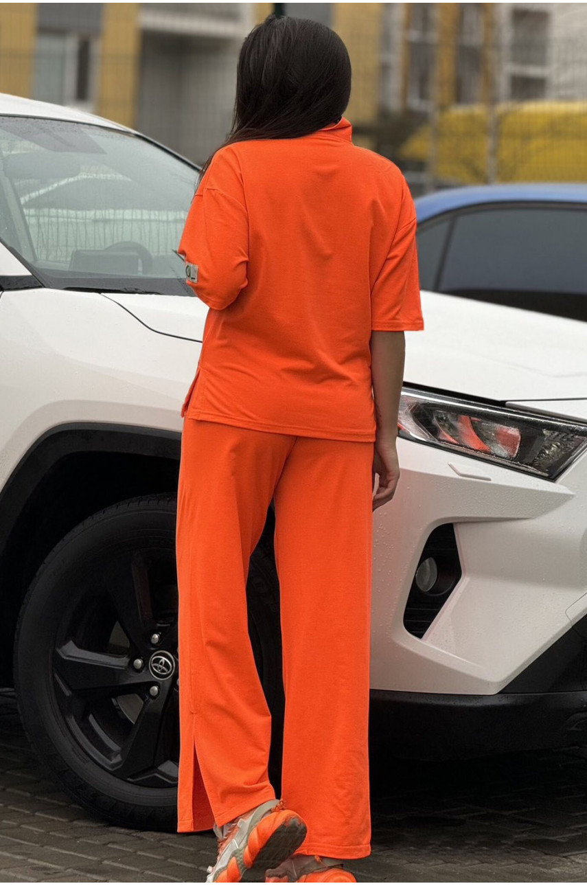 Спортивный костюм женский оранжевого цвета 741 178350