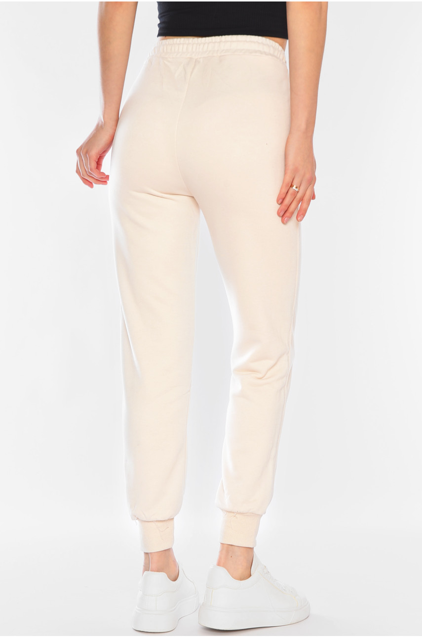 Спортивні штани жіночі молочного кольору 8523 178604