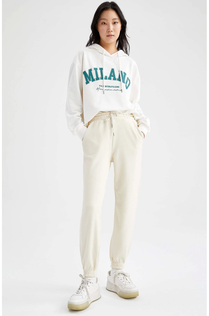 Спортивні штани жіночі молочного кольору 178828