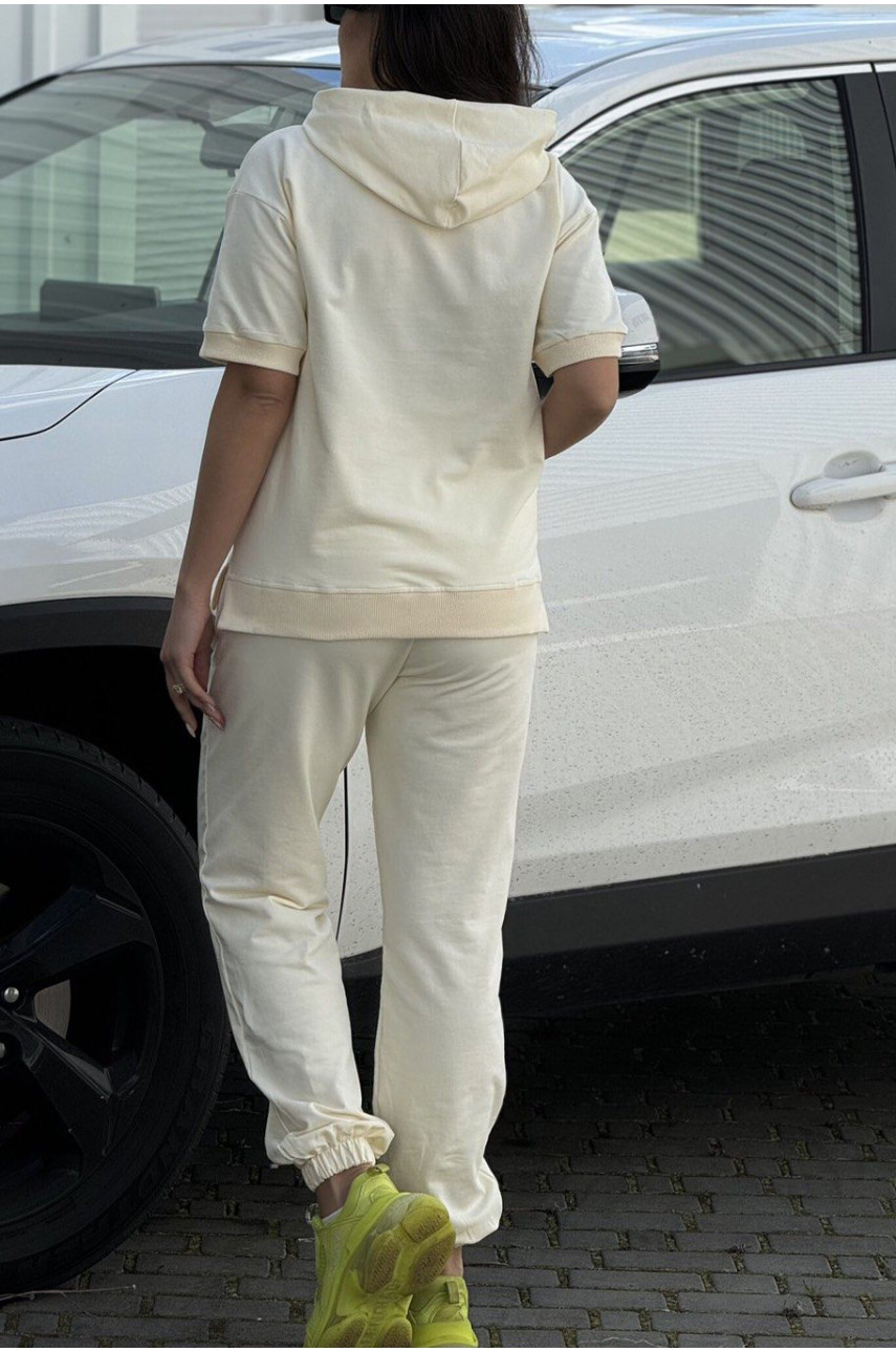Спортивный костюм женский молочного цвета 3010 179050