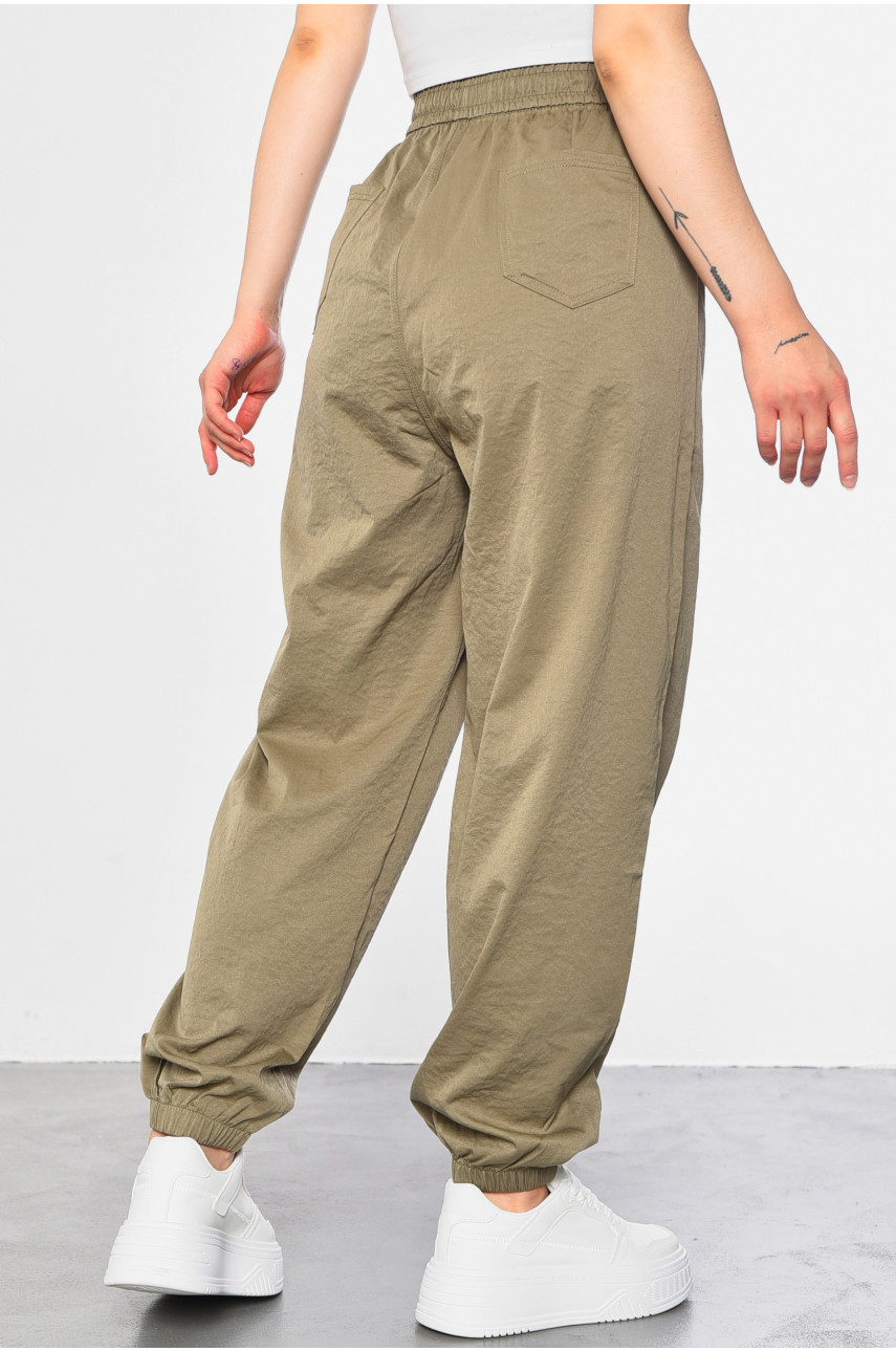 Штани жіночі напівбатальні однотонні світло-сірого кольору А4096-1 182924 Штани жіночі напівбатальні однотонні світло-сірого кольору А4096-1 182924