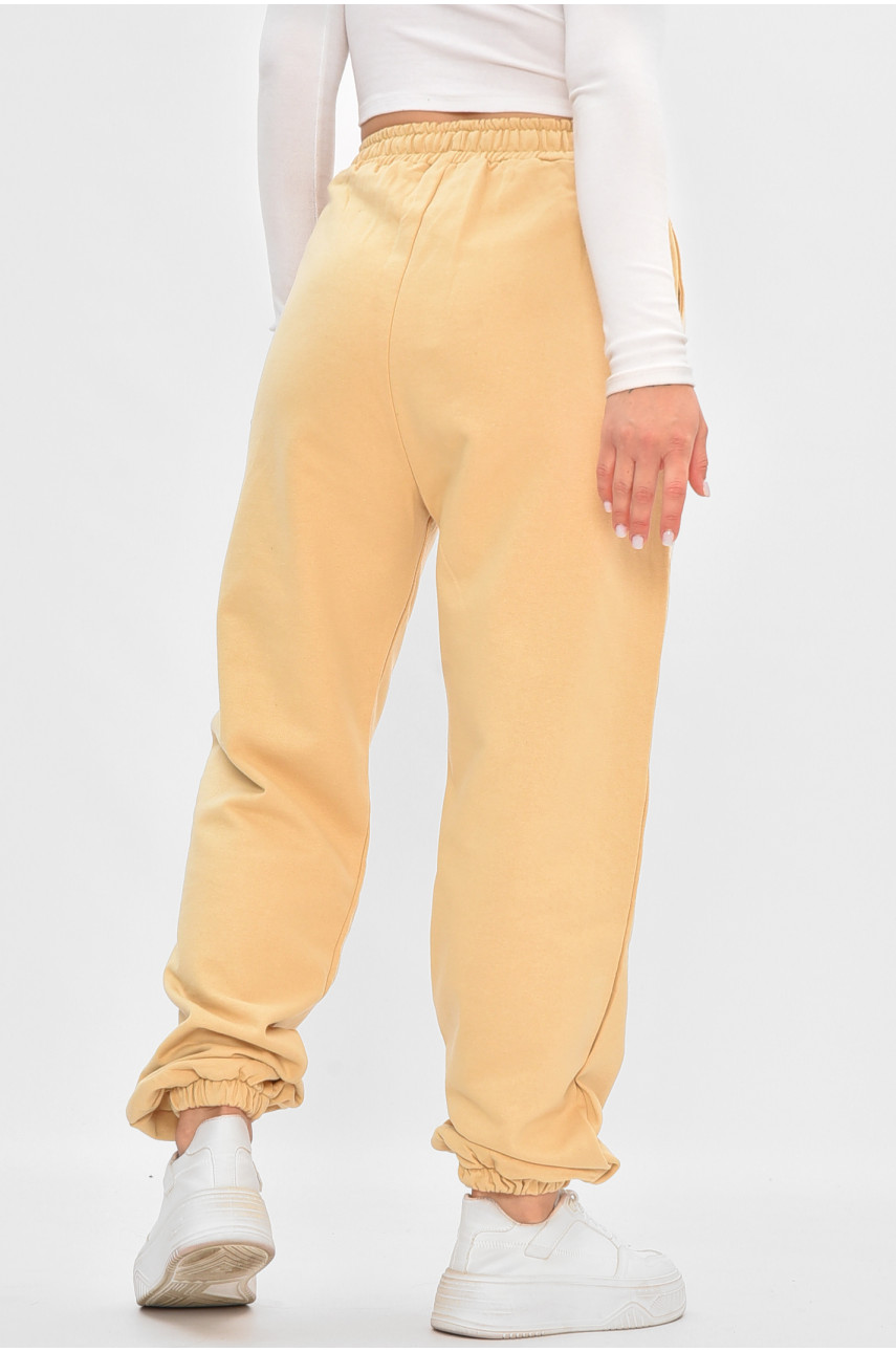 Спортивні штани жіночі на флісі бежевого кольору 188277