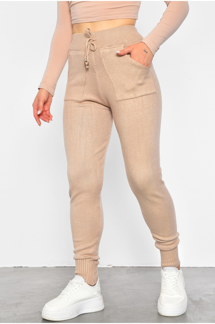Штани жіночі трикотажні бежевого кольору 188283 Штани жіночі трикотажні бежевого кольору 188283