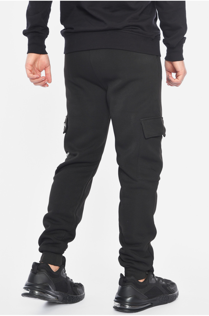 Спортивные штаны мужские на флисе черного цвета L-6718 192144 Спортивные штаны мужские на флисе черного цвета L-6718 192144