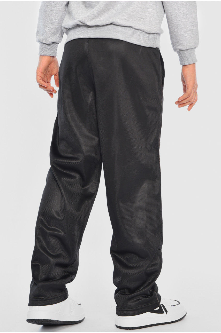 Спортивні штани підліткові для хлопчика на невеликому флісі чорного кольору 195450 Спортивні штани підліткові для хлопчика на невеликому флісі чорного кольору 195450