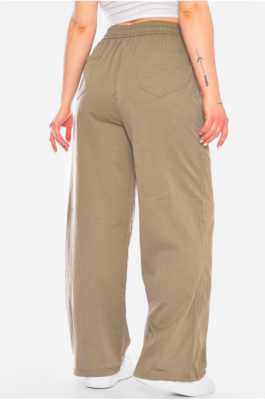 Штани жіночі однотонні напівбатальні темно-бежевого кольору 4095-3 198249