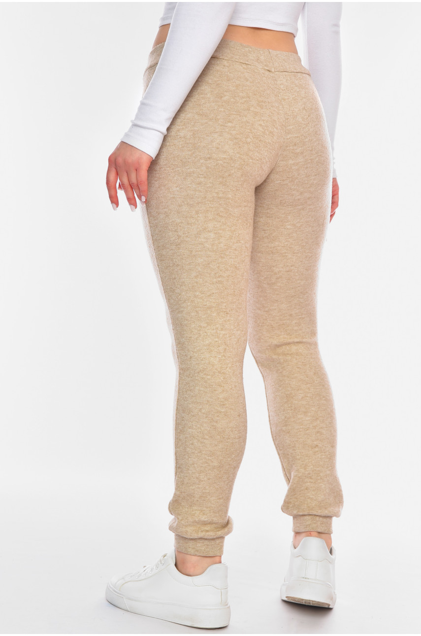 Штани жіночі бежевого кольору 198923 Штани жіночі бежевого кольору 198923