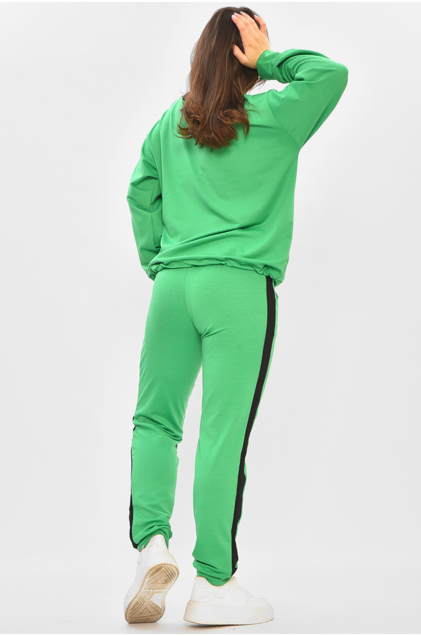 Костюм женский однотонный светло-зеленого цвета 409 205087