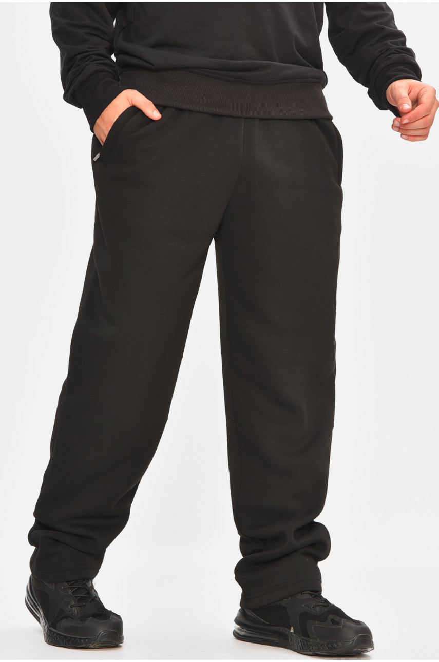 Спортивные штаны мужские на флисе полубатальные черного цвета 41715 207144