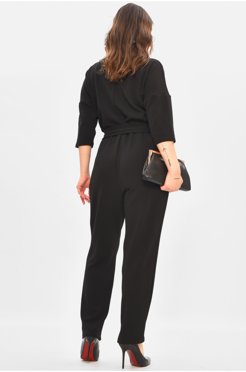 Комбінезон жіночий однотонний чорного кольору 8451 208176