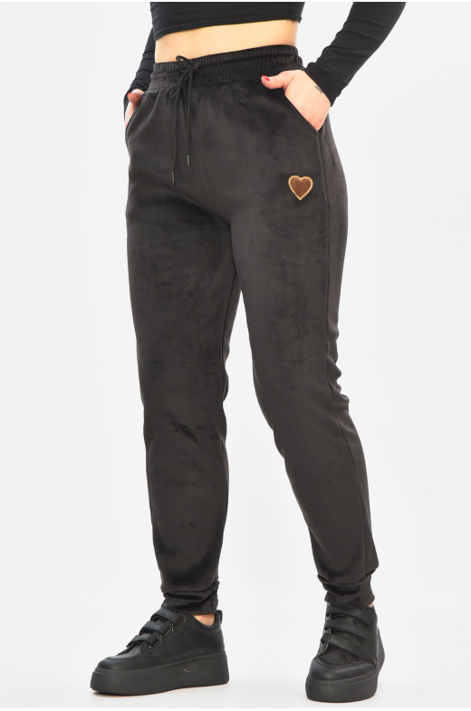 Спортивные штаны женские на искусственном меху черного цвета 208868