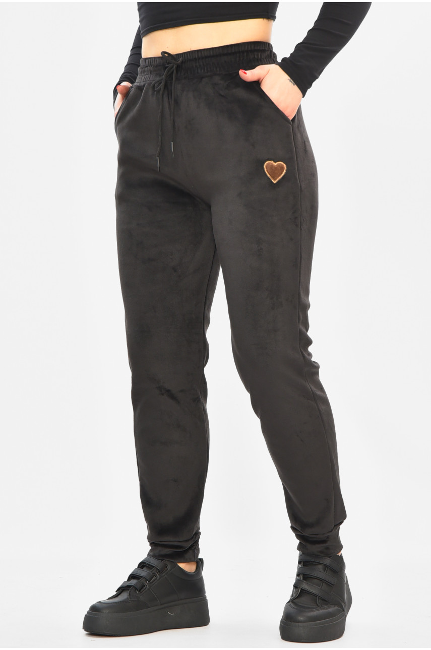 Спортивные штаны женские на искусственном меху черного цвета 208868
