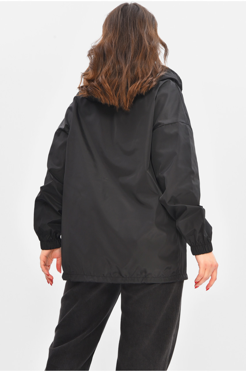 Вітровка жіноча однотонна чорного кольору 1002 209020