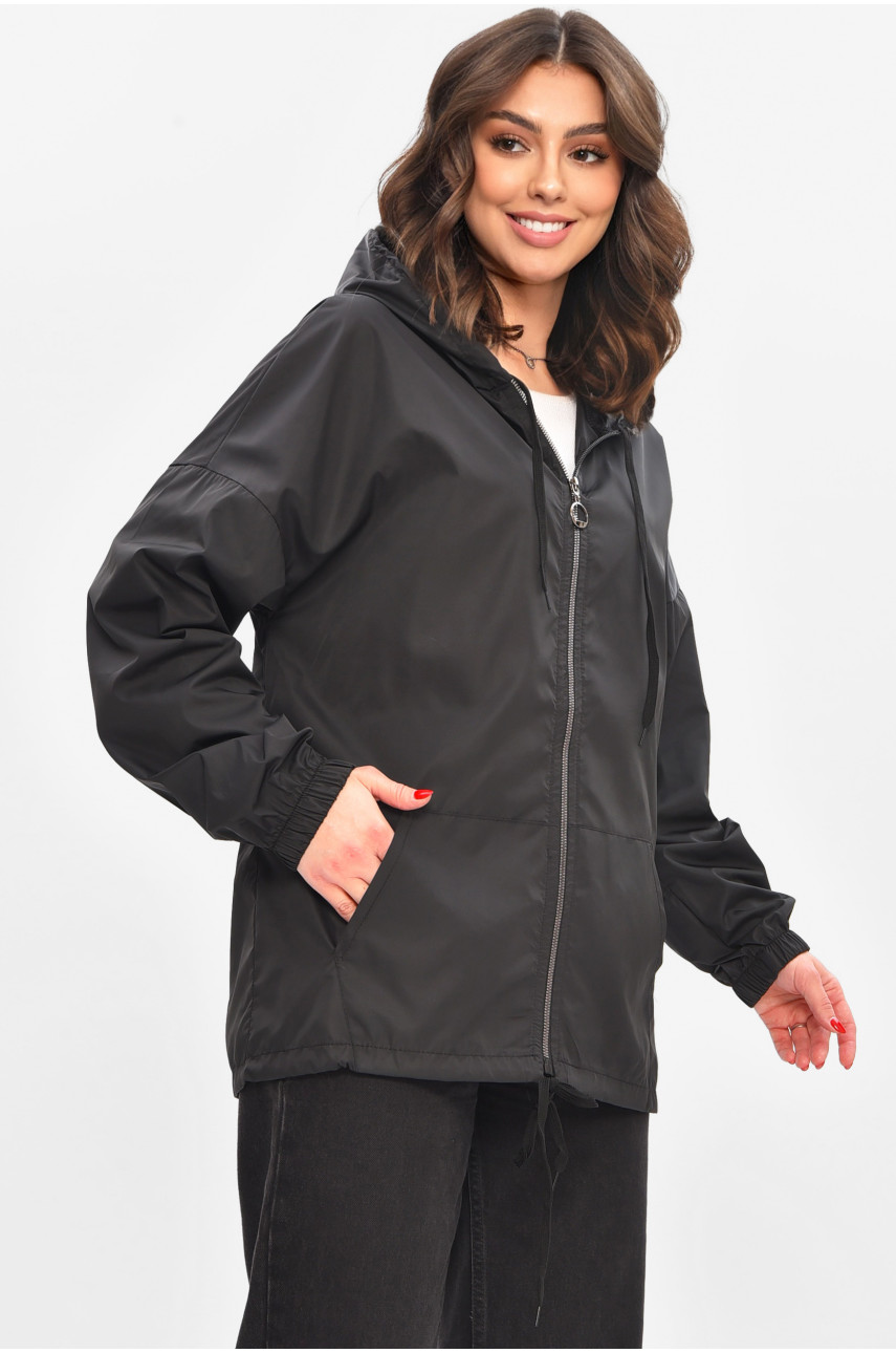 Вітровка жіноча однотонна чорного кольору 1002 209025