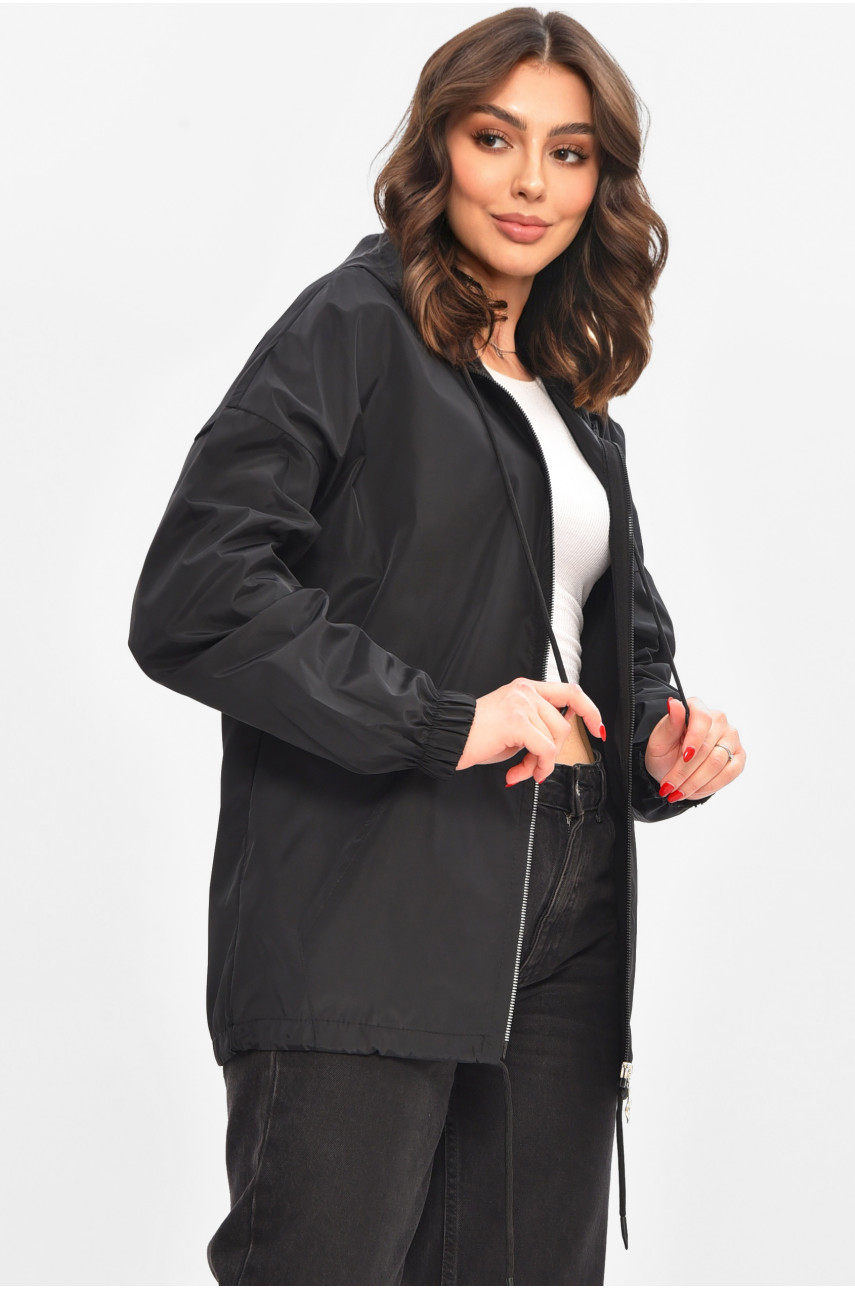 Вітровка жіноча однотонна чорного кольору 1002 209026