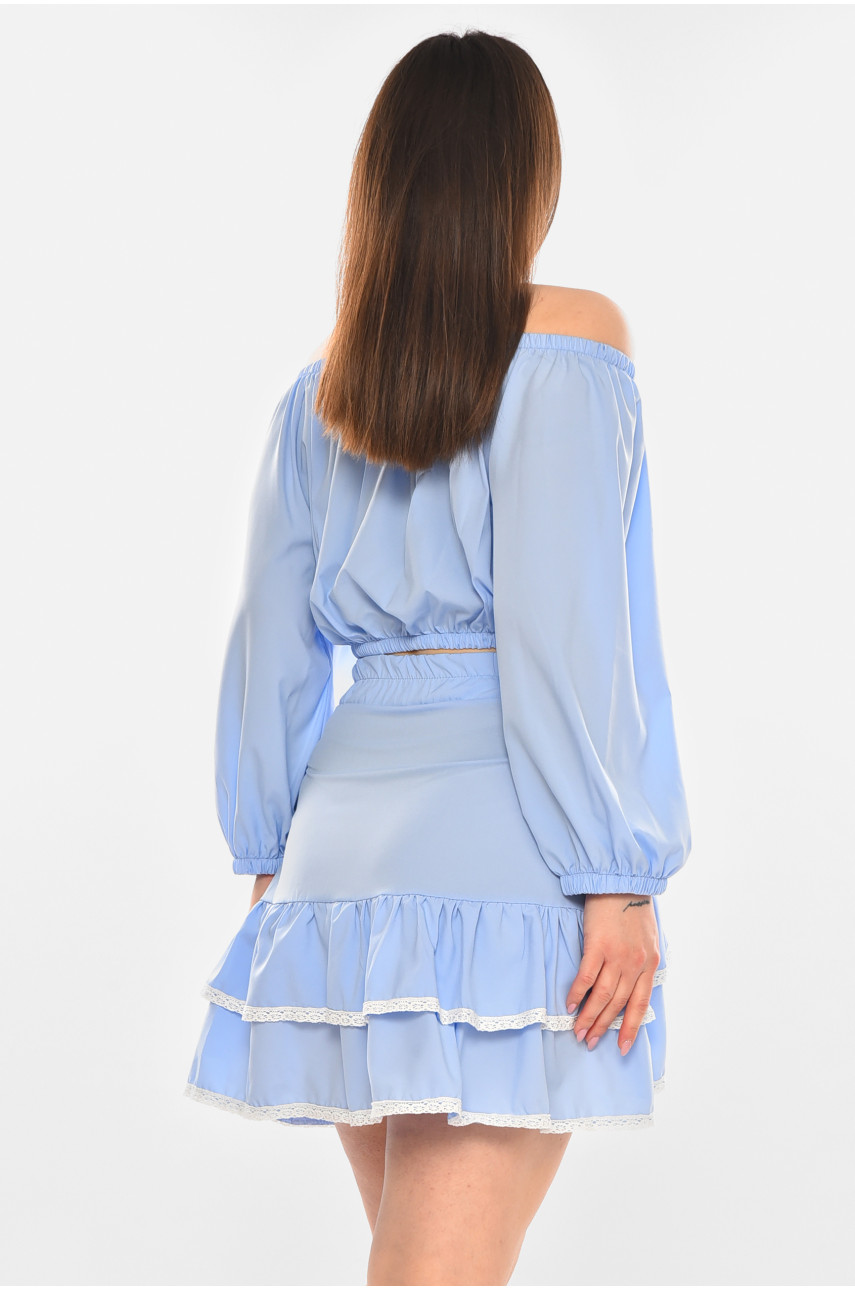 Костюм женский однотонный с рюшами голубого цвета 210272