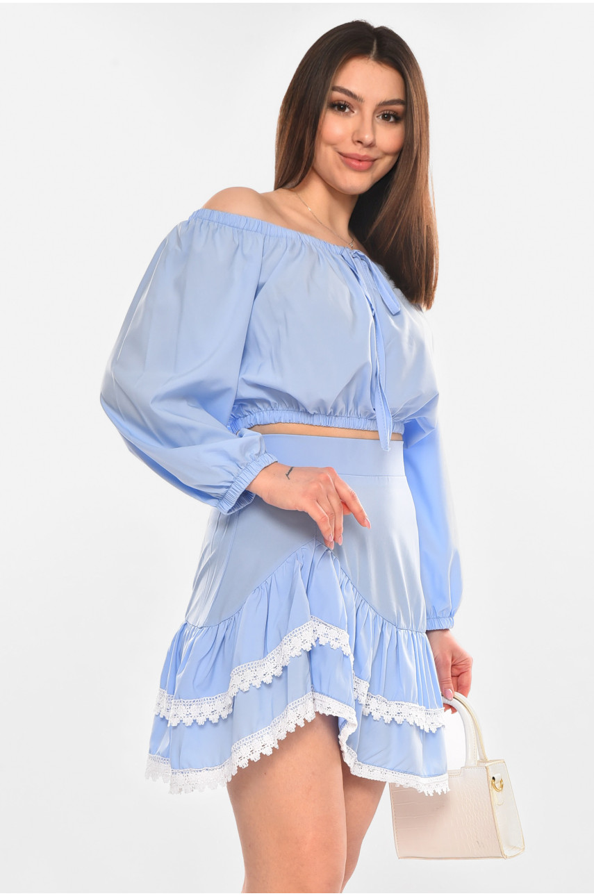 Костюм женский однотонный с рюшами голубого цвета 210273