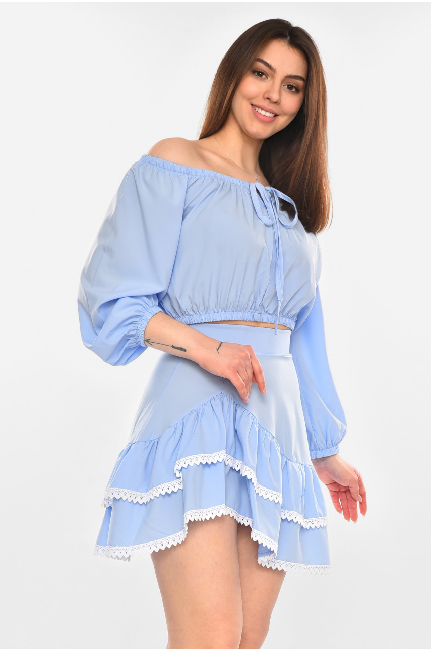 Костюм женский однотонный с рюшами голубого цвета 210276