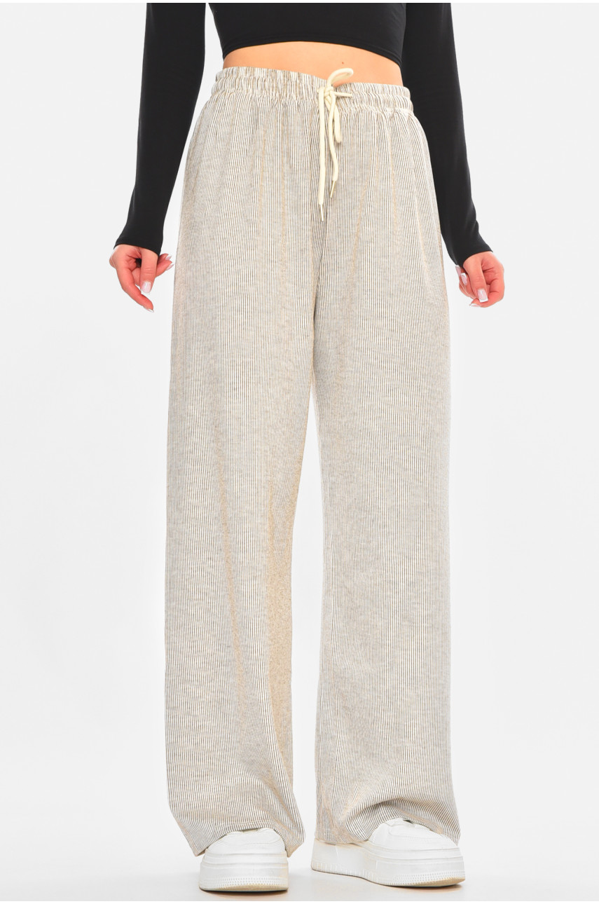 Штани жіночі бежевого кольору з принтом 8812 212440