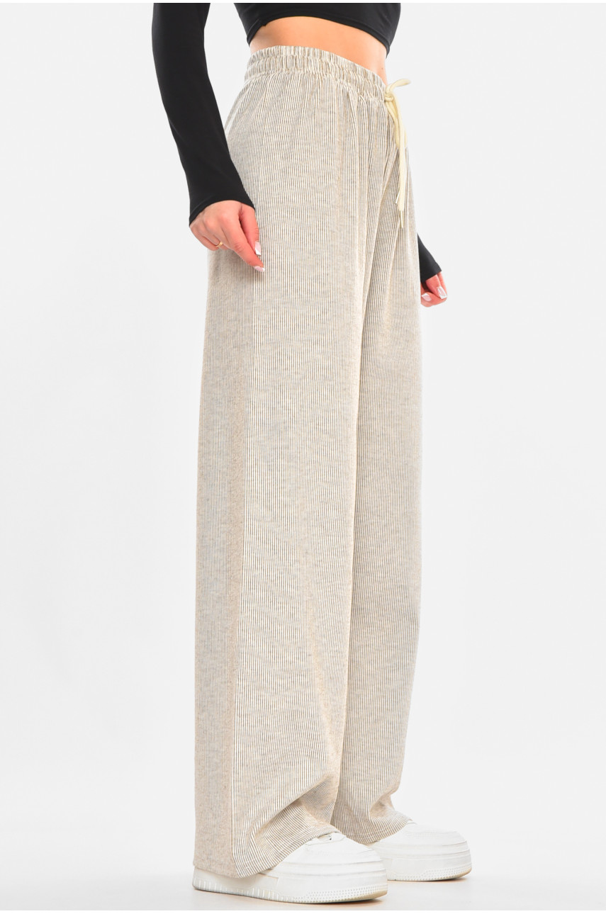 Штани жіночі бежевого кольору з принтом 8812 212440