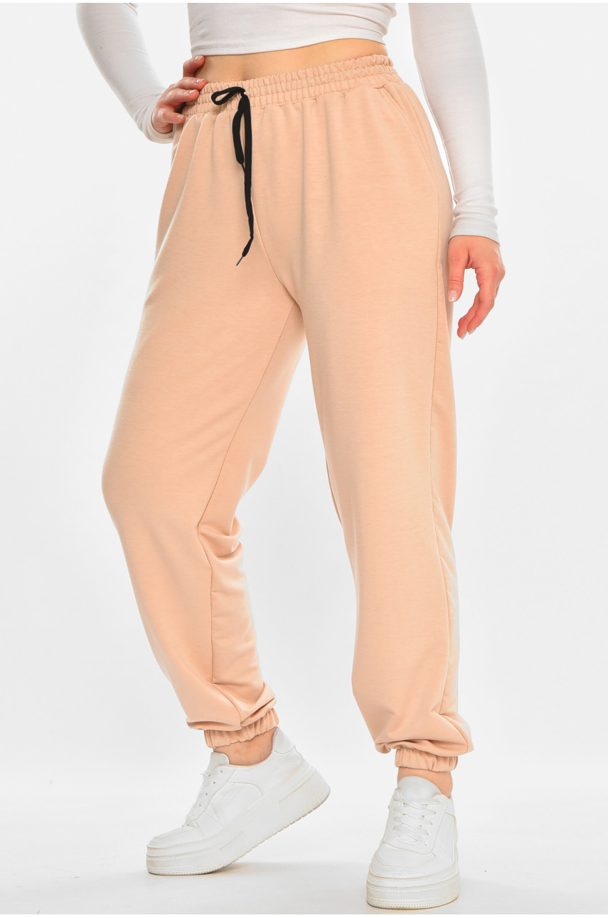 Спортивні штани жіночі напівбатальні однотонні бежевого кольору 212833