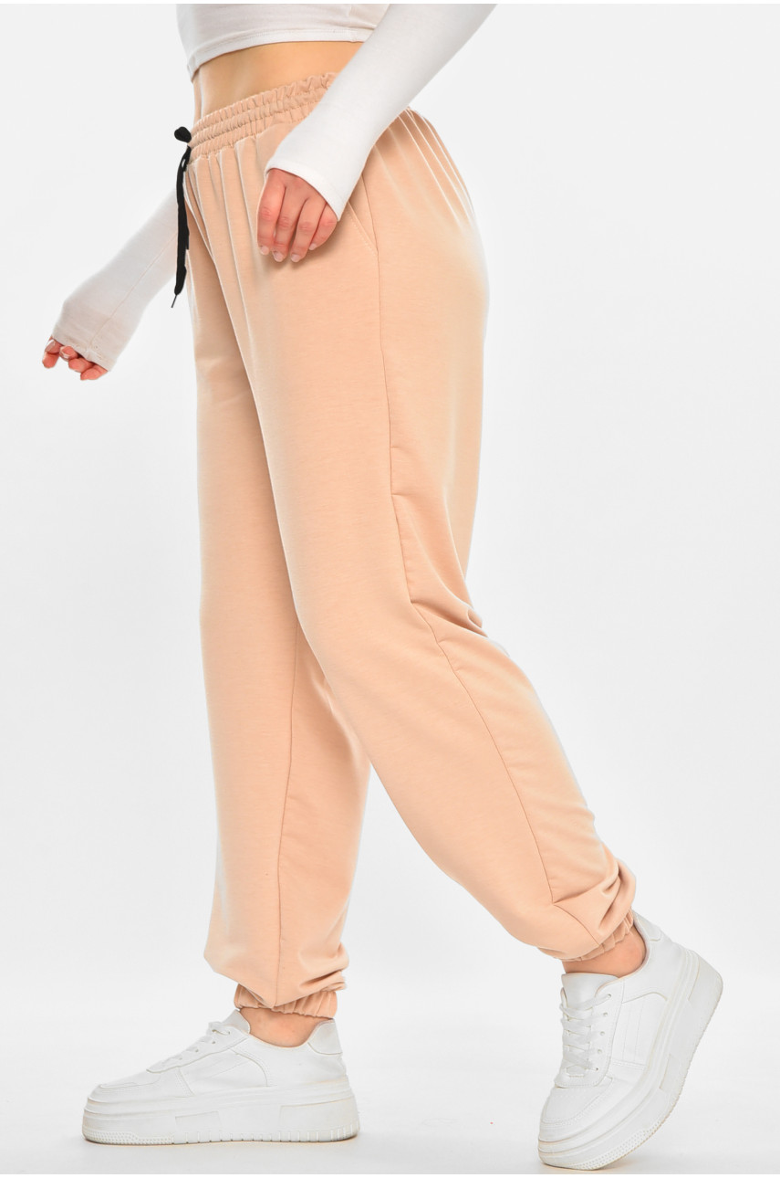 Спортивні штани жіночі напівбатальні однотонні бежевого кольору 212833