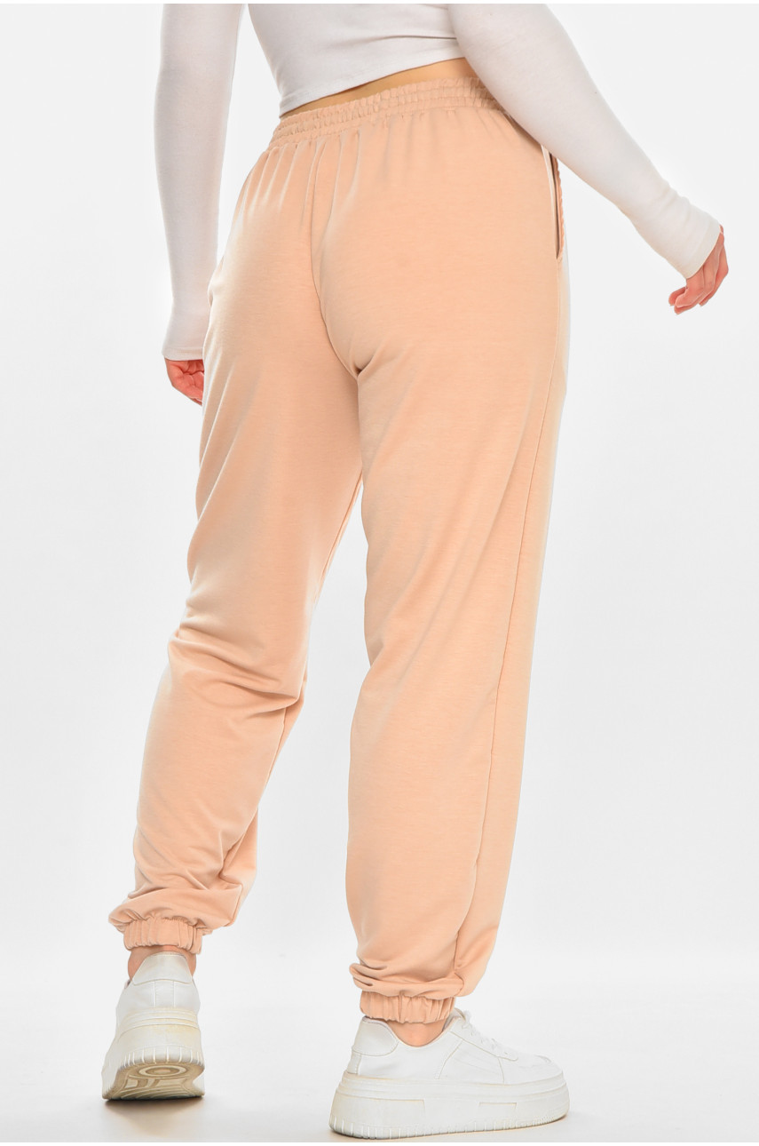 Спортивні штани жіночі напівбатальні однотонні бежевого кольору 212833