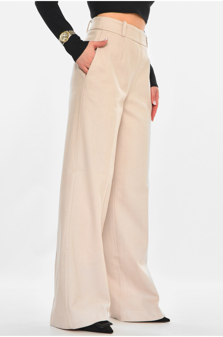 Штани жіночі бежевого кольору з принтом 2306 213168