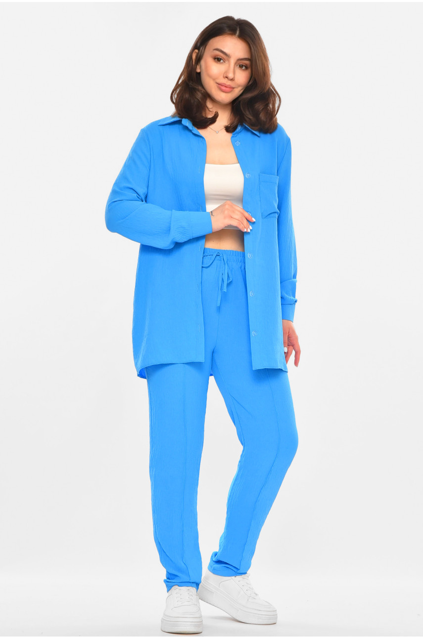 Костюм жіночий однотонний синього кольору 213638